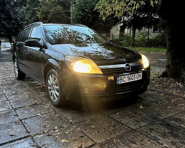 Черный Опель Астра, объемом двигателя 1.6 л и пробегом 235 тыс. км за 4900 $, фото 1 на Automoto.ua