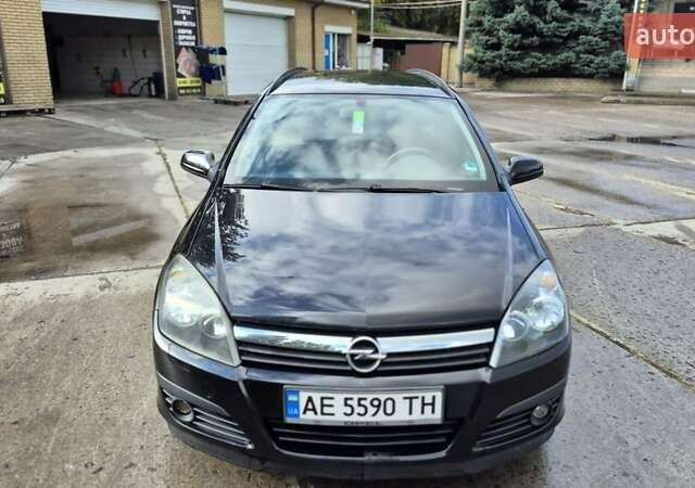 Черный Опель Астра, объемом двигателя 1.6 л и пробегом 264 тыс. км за 4700 $, фото 1 на Automoto.ua