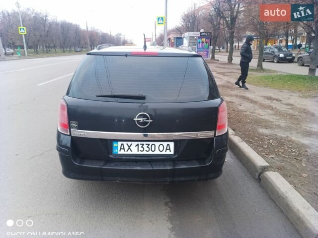 Черный Опель Астра, объемом двигателя 1.6 л и пробегом 300 тыс. км за 5000 $, фото 1 на Automoto.ua