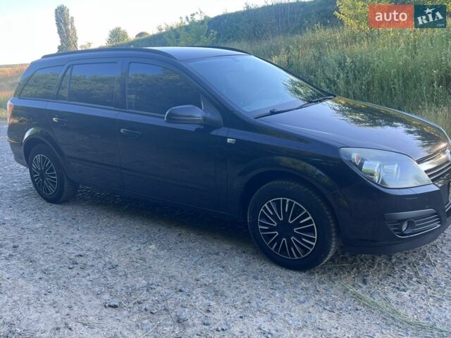 Черный Опель Астра, объемом двигателя 1.6 л и пробегом 279 тыс. км за 5000 $, фото 1 на Automoto.ua