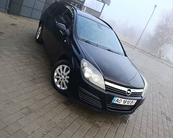 Черный Опель Астра, объемом двигателя 1.3 л и пробегом 247 тыс. км за 4300 $, фото 1 на Automoto.ua