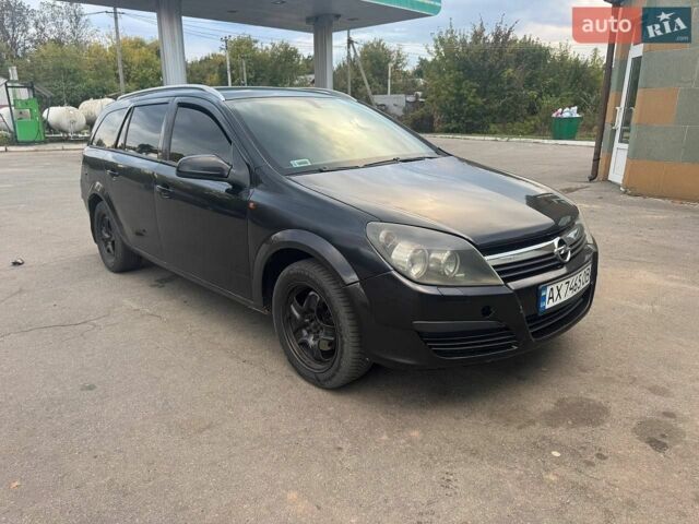 Чорний Опель Астра, об'ємом двигуна 1.25 л та пробігом 370 тис. км за 3100 $, фото 1 на Automoto.ua