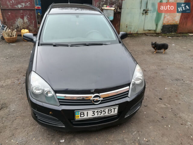 Черный Опель Астра, объемом двигателя 1.3 л и пробегом 163 тыс. км за 4900 $, фото 1 на Automoto.ua