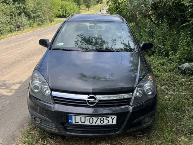 Черный Опель Астра, объемом двигателя 1.9 л и пробегом 370 тыс. км за 1350 $, фото 1 на Automoto.ua