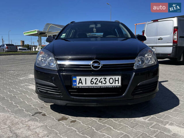 Черный Опель Астра, объемом двигателя 1.6 л и пробегом 270 тыс. км за 4200 $, фото 1 на Automoto.ua