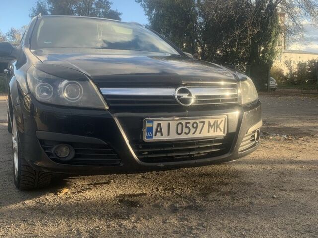 Черный Опель Астра, объемом двигателя 1.9 л и пробегом 266 тыс. км за 4600 $, фото 1 на Automoto.ua