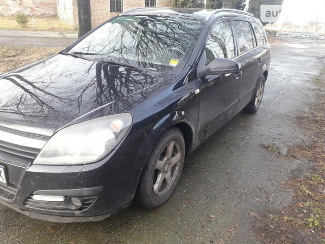 Черный Опель Астра, объемом двигателя 1.8 л и пробегом 180 тыс. км за 4800 $, фото 1 на Automoto.ua