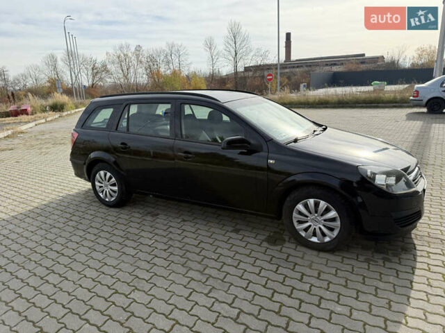 Черный Опель Астра, объемом двигателя 1.69 л и пробегом 420 тыс. км за 5500 $, фото 1 на Automoto.ua