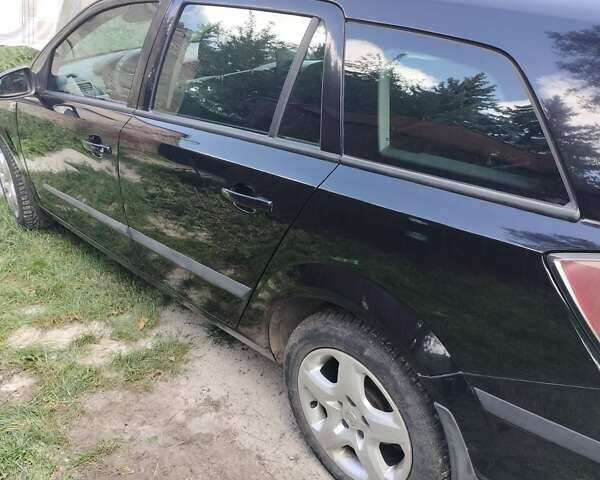 Черный Опель Астра, объемом двигателя 1.3 л и пробегом 268 тыс. км за 4550 $, фото 1 на Automoto.ua