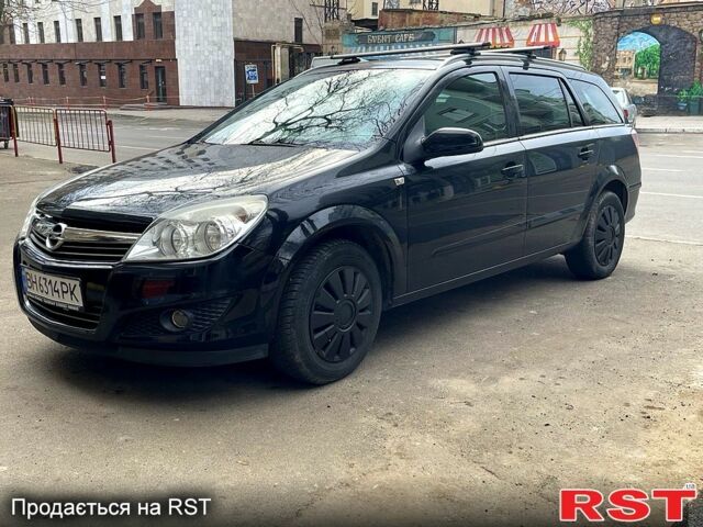 Черный Опель Астра, объемом двигателя 1.6 л и пробегом 255 тыс. км за 3999 $, фото 1 на Automoto.ua