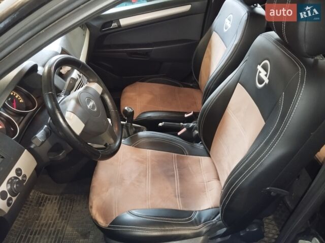 Черный Опель Астра, объемом двигателя 1.6 л и пробегом 283 тыс. км за 4400 $, фото 1 на Automoto.ua