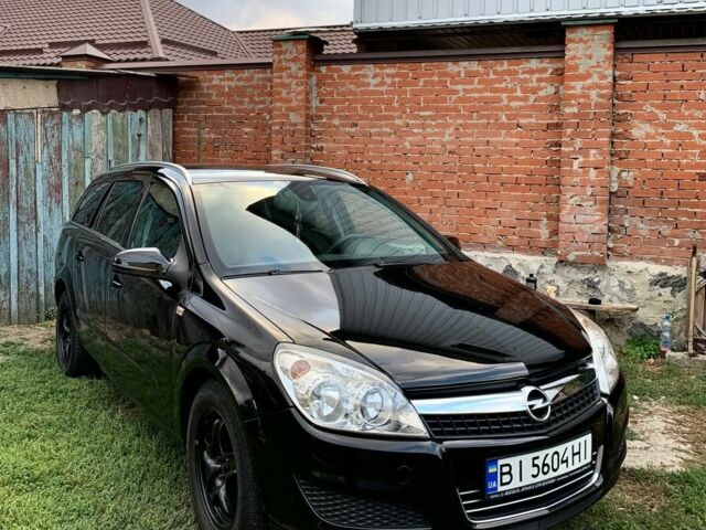 Черный Опель Астра, объемом двигателя 1.6 л и пробегом 205 тыс. км за 5000 $, фото 1 на Automoto.ua