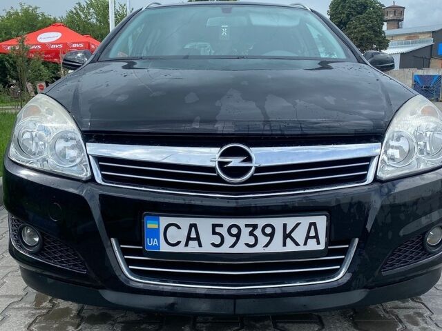 Чорний Опель Астра, об'ємом двигуна 1.6 л та пробігом 210 тис. км за 4499 $, фото 1 на Automoto.ua