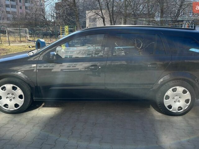 Черный Опель Астра, объемом двигателя 1.7 л и пробегом 340 тыс. км за 5200 $, фото 1 на Automoto.ua