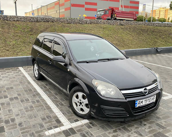 Чорний Опель Астра, об'ємом двигуна 1.25 л та пробігом 202 тис. км за 4500 $, фото 1 на Automoto.ua