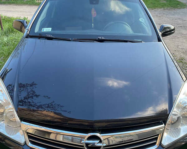 Чорний Опель Астра, об'ємом двигуна 1.69 л та пробігом 240 тис. км за 4900 $, фото 1 на Automoto.ua