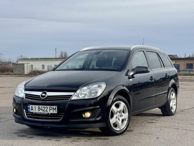 Черный Опель Астра, объемом двигателя 1.6 л и пробегом 239 тыс. км за 5350 $, фото 1 на Automoto.ua