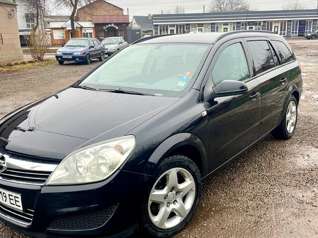 Черный Опель Астра, объемом двигателя 1.6 л и пробегом 245 тыс. км за 5400 $, фото 1 на Automoto.ua