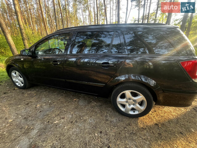 Черный Опель Астра, объемом двигателя 1.6 л и пробегом 165 тыс. км за 5800 $, фото 1 на Automoto.ua