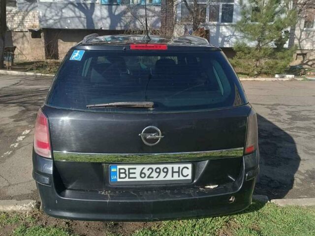 Черный Опель Астра, объемом двигателя 1.7 л и пробегом 282 тыс. км за 5000 $, фото 1 на Automoto.ua
