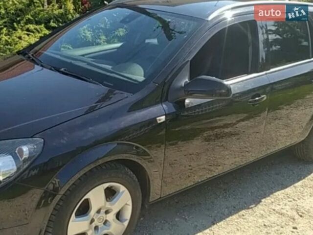 Черный Опель Астра, объемом двигателя 1.8 л и пробегом 170 тыс. км за 4700 $, фото 1 на Automoto.ua
