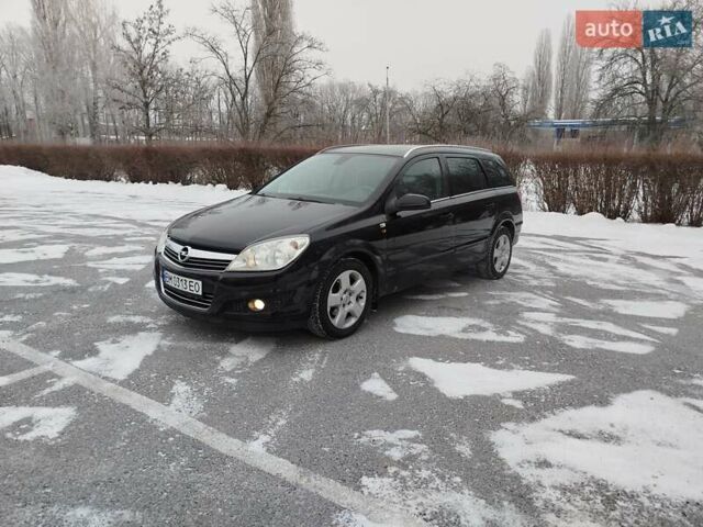 Черный Опель Астра, объемом двигателя 1.6 л и пробегом 255 тыс. км за 5650 $, фото 1 на Automoto.ua