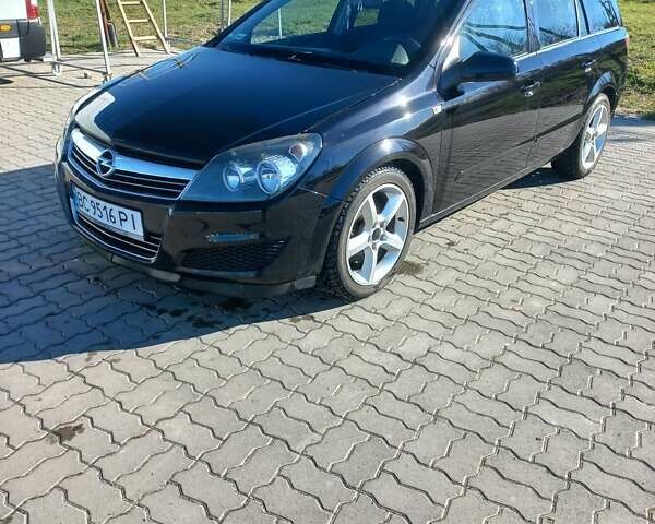 Черный Опель Астра, объемом двигателя 1.91 л и пробегом 278 тыс. км за 5200 $, фото 1 на Automoto.ua