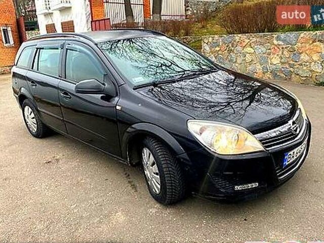 Черный Опель Астра, объемом двигателя 1.2 л и пробегом 250 тыс. км за 4100 $, фото 1 на Automoto.ua