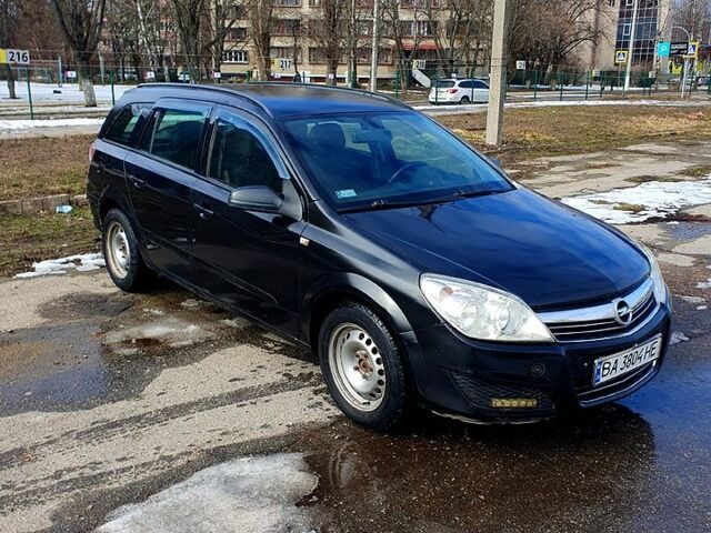 Черный Опель Астра, объемом двигателя 1.2 л и пробегом 230 тыс. км за 3950 $, фото 1 на Automoto.ua