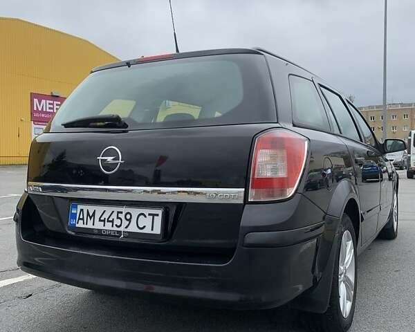 Черный Опель Астра, объемом двигателя 1.9 л и пробегом 232 тыс. км за 4400 $, фото 1 на Automoto.ua