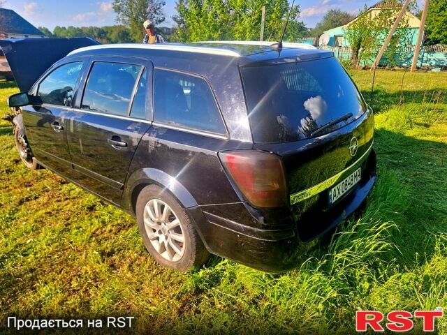 Черный Опель Астра, объемом двигателя 1.6 л и пробегом 207 тыс. км за 1450 $, фото 1 на Automoto.ua