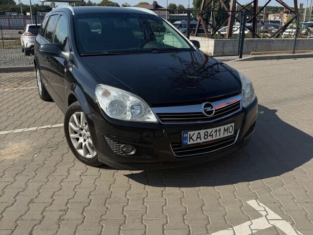 Черный Опель Астра, объемом двигателя 1.6 л и пробегом 235 тыс. км за 5300 $, фото 1 на Automoto.ua