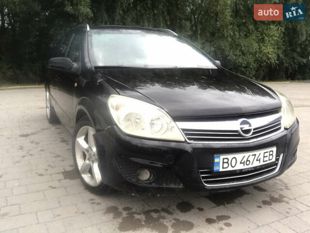 Черный Опель Астра, объемом двигателя 1.6 л и пробегом 305 тыс. км за 4000 $, фото 1 на Automoto.ua