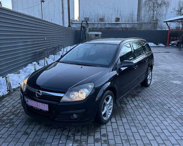 Черный Опель Астра, объемом двигателя 1.6 л и пробегом 228 тыс. км за 4400 $, фото 1 на Automoto.ua