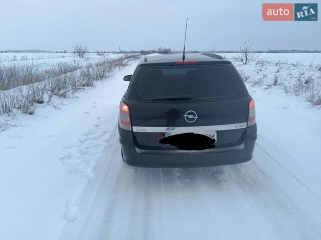 Черный Опель Астра, объемом двигателя 1.7 л и пробегом 248 тыс. км за 5100 $, фото 1 на Automoto.ua