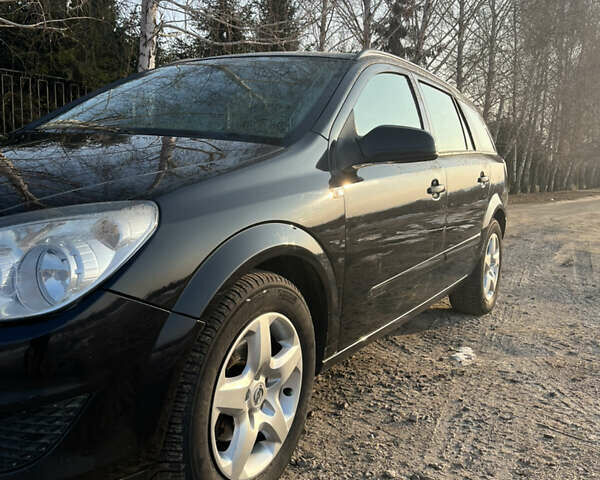 Черный Опель Астра, объемом двигателя 1.69 л и пробегом 270 тыс. км за 5500 $, фото 1 на Automoto.ua