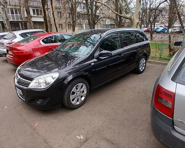 Черный Опель Астра, объемом двигателя 1.6 л и пробегом 243 тыс. км за 5400 $, фото 1 на Automoto.ua