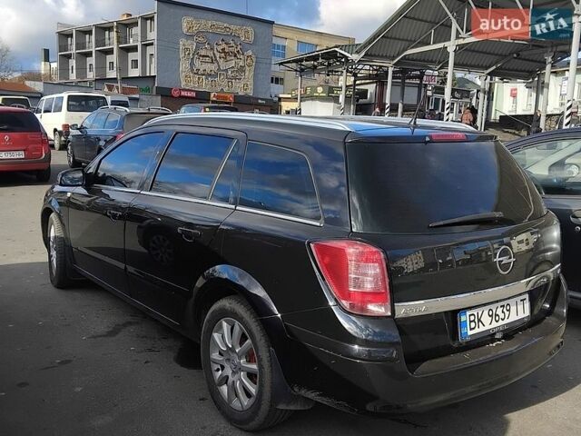 Черный Опель Астра, объемом двигателя 1.8 л и пробегом 230 тыс. км за 6000 $, фото 1 на Automoto.ua