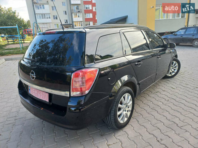 Черный Опель Астра, объемом двигателя 1.6 л и пробегом 260 тыс. км за 6000 $, фото 1 на Automoto.ua