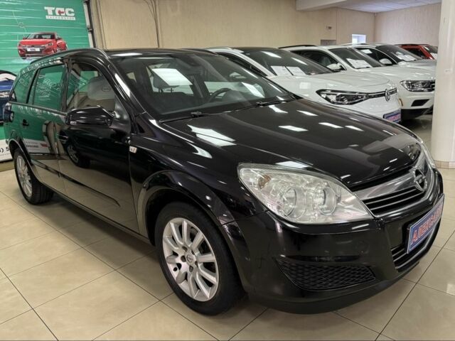 Черный Опель Астра, объемом двигателя 1.4 л и пробегом 210 тыс. км за 5600 $, фото 1 на Automoto.ua