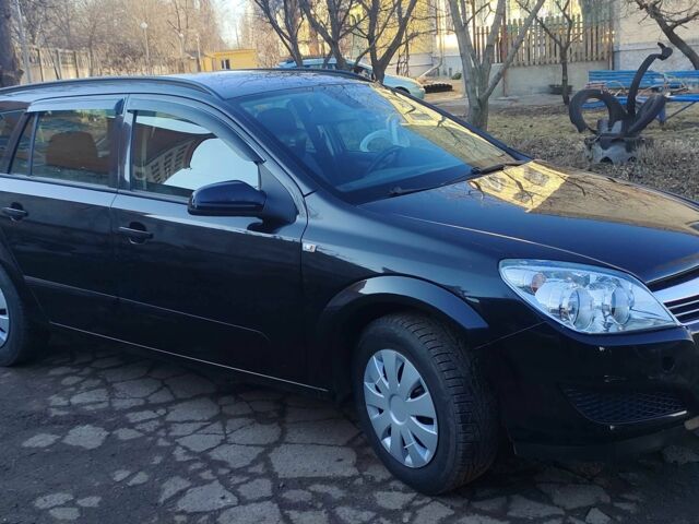 Черный Опель Астра, объемом двигателя 1.6 л и пробегом 228 тыс. км за 5900 $, фото 1 на Automoto.ua