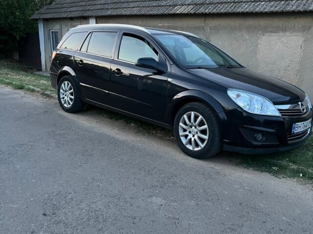 Черный Опель Астра, объемом двигателя 1.69 л и пробегом 220 тыс. км за 5500 $, фото 1 на Automoto.ua