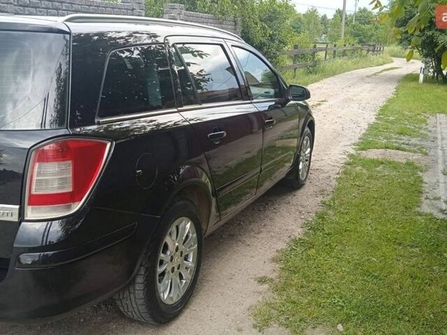 Черный Опель Астра, объемом двигателя 1.7 л и пробегом 230 тыс. км за 4300 $, фото 1 на Automoto.ua
