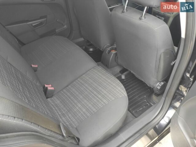 Черный Опель Астра, объемом двигателя 1.6 л и пробегом 227 тыс. км за 5850 $, фото 1 на Automoto.ua