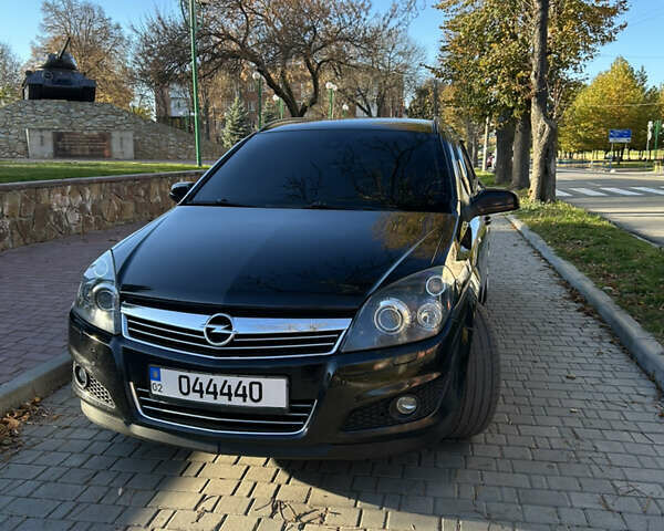 Черный Опель Астра, объемом двигателя 1.9 л и пробегом 191 тыс. км за 7000 $, фото 1 на Automoto.ua