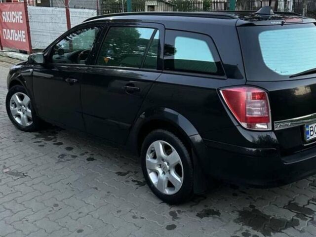 Черный Опель Астра, объемом двигателя 1.7 л и пробегом 257 тыс. км за 5500 $, фото 1 на Automoto.ua
