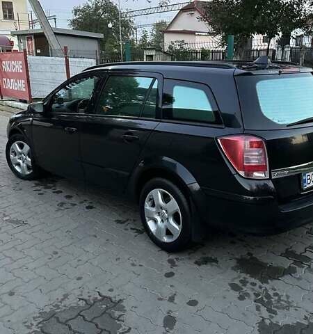 Черный Опель Астра, объемом двигателя 1.7 л и пробегом 257 тыс. км за 5500 $, фото 1 на Automoto.ua