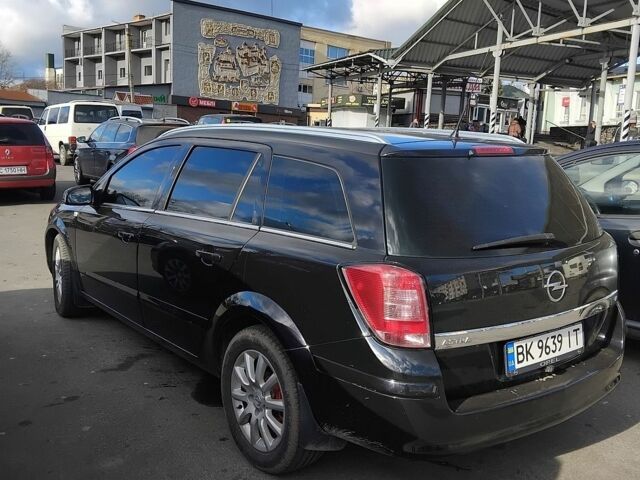 Черный Опель Астра, объемом двигателя 1.8 л и пробегом 230 тыс. км за 6000 $, фото 1 на Automoto.ua