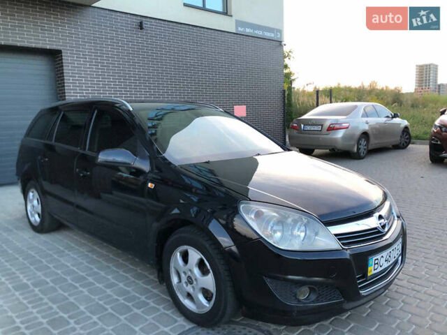 Черный Опель Астра, объемом двигателя 1.7 л и пробегом 253 тыс. км за 3950 $, фото 1 на Automoto.ua