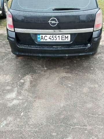 Черный Опель Астра, объемом двигателя 1.9 л и пробегом 320 тыс. км за 5600 $, фото 1 на Automoto.ua